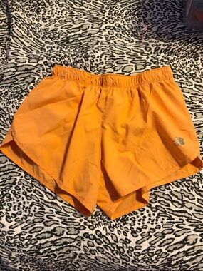 New Balance Women’s Peachy Orange Athletic Shorts